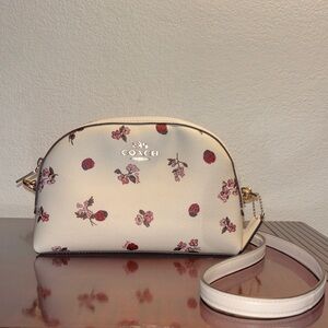 Coach Madi crossbody bag in chalk leather with a ladybug floral print
